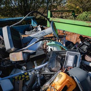 Discarded items in a skip