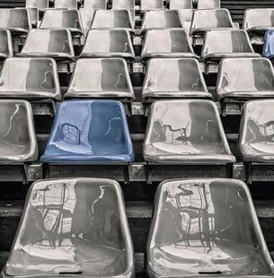 Rows of empty seats at a stadium